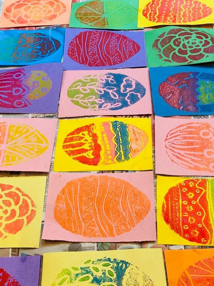 Rows of bright printed Easter eggs