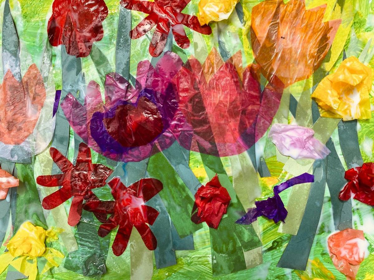 Tissue paper flowers in a meadow