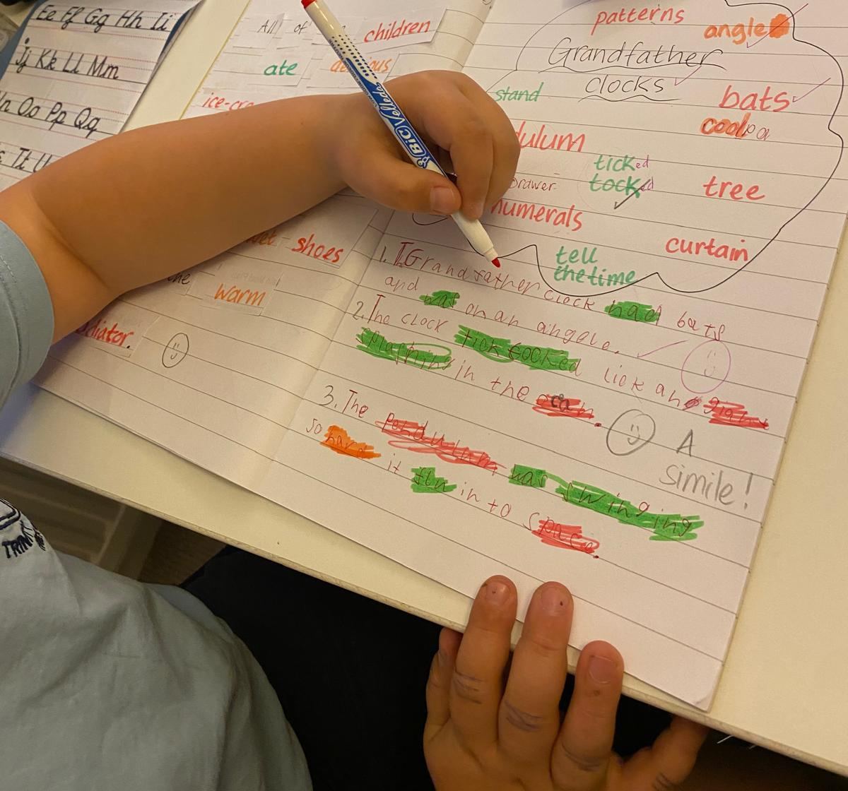 A child's sentences and word cloud about grandfather clocks